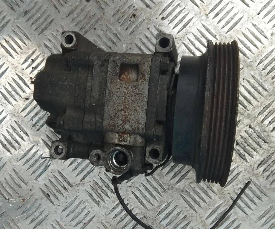 компрессор кондиционера Mazda 626 GE 1991, 2.0 л., i, бензин, АКПП, седан, передний привод, PANASONIC, H12A1AA4DG - фото №1