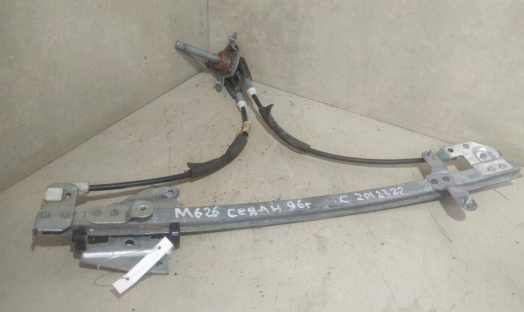 стеклоподъемник передний левый Mazda 626 GE 1994, седан - фото №1