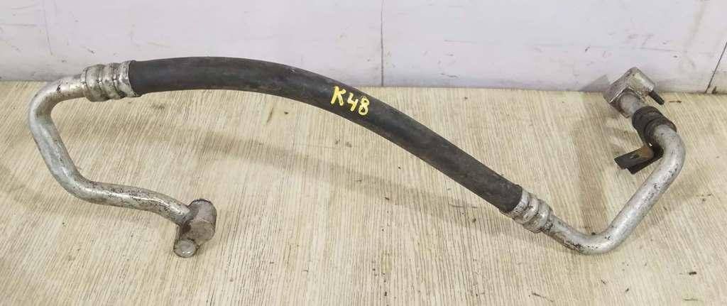 трубка кондиционера Kia Shuma 2 поколение 2003, 1.8 л., i, бензин, 5МКПП, черный, хетчбэк 5 дв., передний привод, 0K2N161460A - фото №1