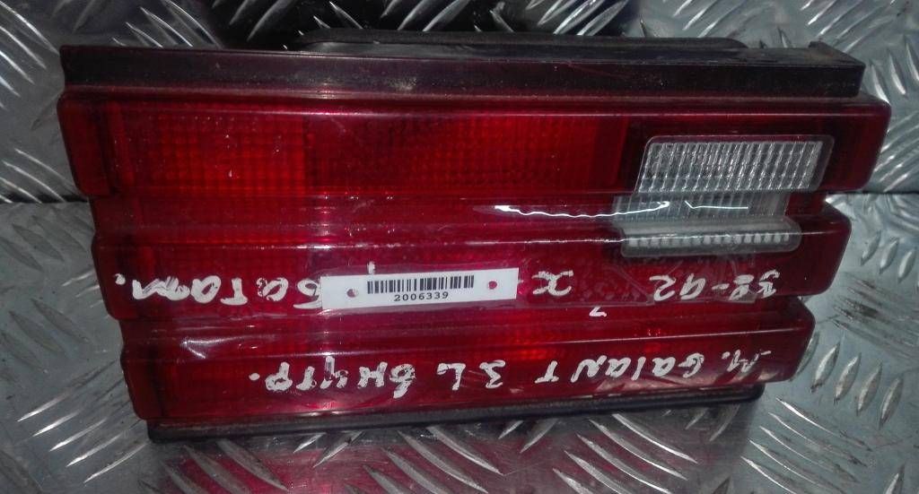 фонарь крышки багажника левый Mitsubishi Galant 5 поколение 1990, хетчбэк 5 дв. - фото №1