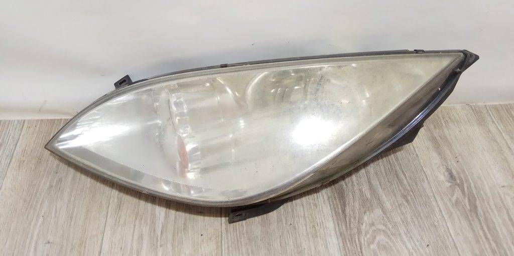 фара левая Mitsubishi Colt 6 поколение (Z20/Z30) 2006, 1.5 л., OM 639.939, дизель, МКПП, черный, хетчбэк 5 дв., передний привод, 301208201 - фото №1