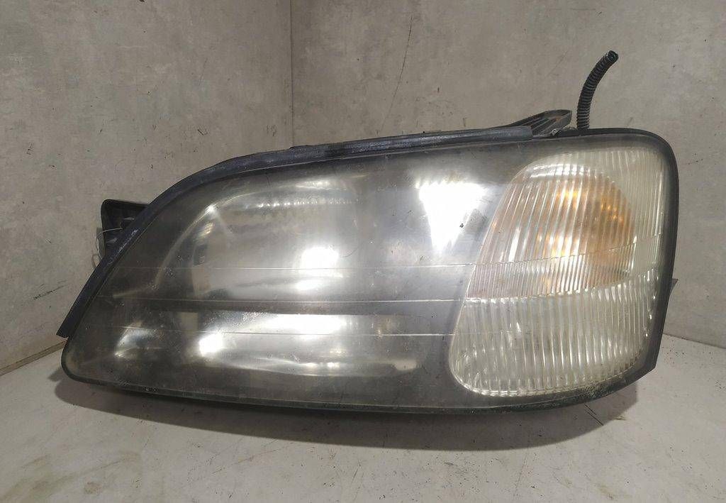 фара левая Subaru Legacy 3 поколение 2001, 2.5 л., i, бензин - фото №1