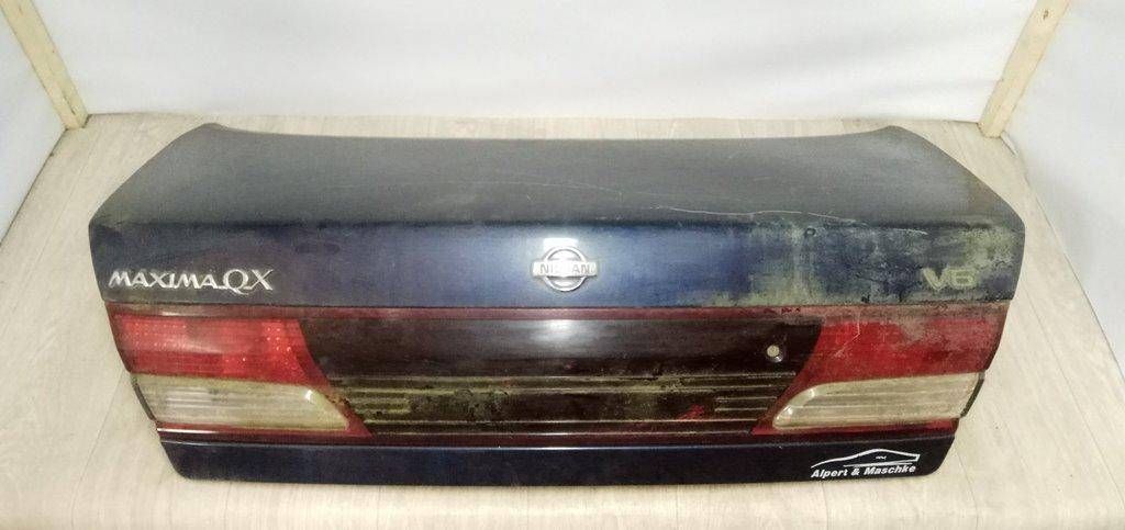 замок багажника Nissan Maxima A32 2000, синий, седан - фото №1