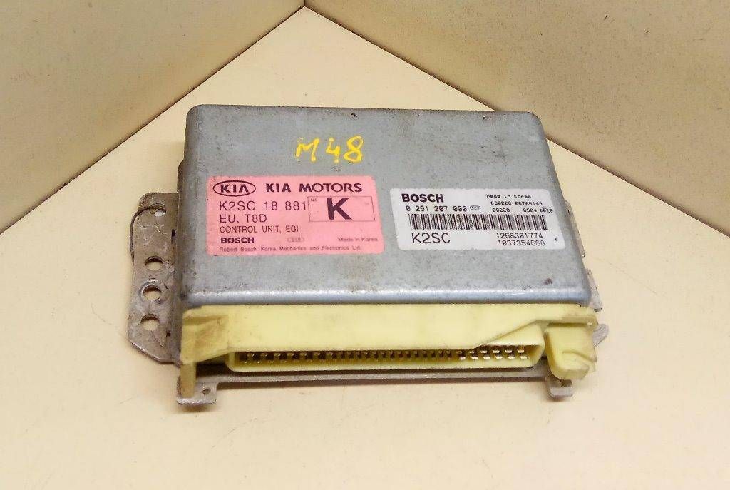 блок управления двигателем Kia Shuma 2 поколение 2003, 1.8 л., i, бензин, 5МКПП, черный, хетчбэк 5 дв., передний привод, BOSCH, K25C18881, 0261207000, MOTORS - фото №1