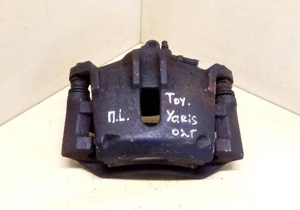 суппорт передний левый Toyota Yaris P1 2002, 0204Y0B1169, 4775052010 - фото №1