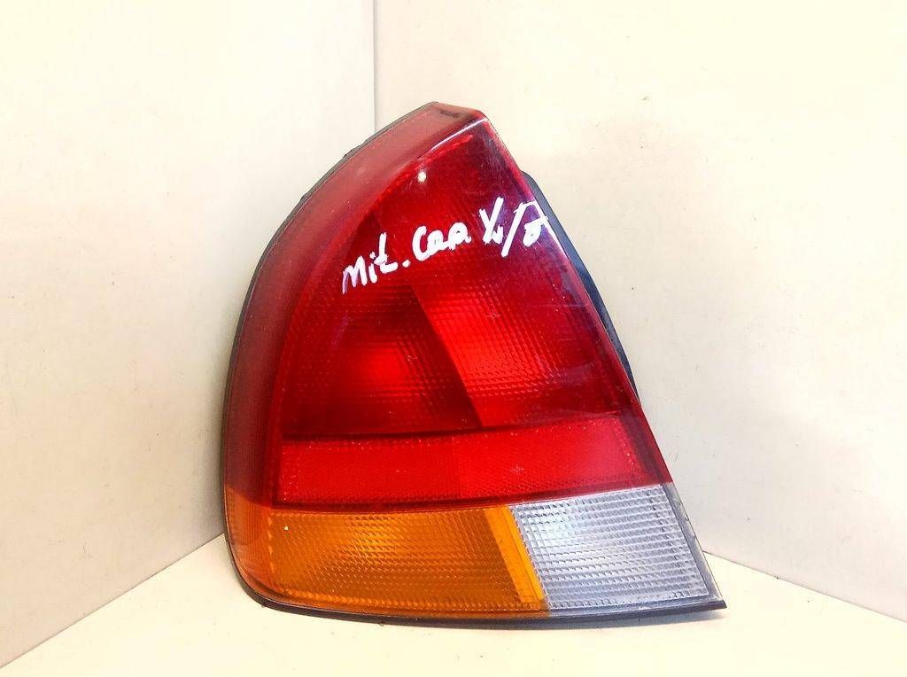 фонарь задний левый Mitsubishi Carisma 1 поколение 1997, хетчбэк 5 дв. - фото №1