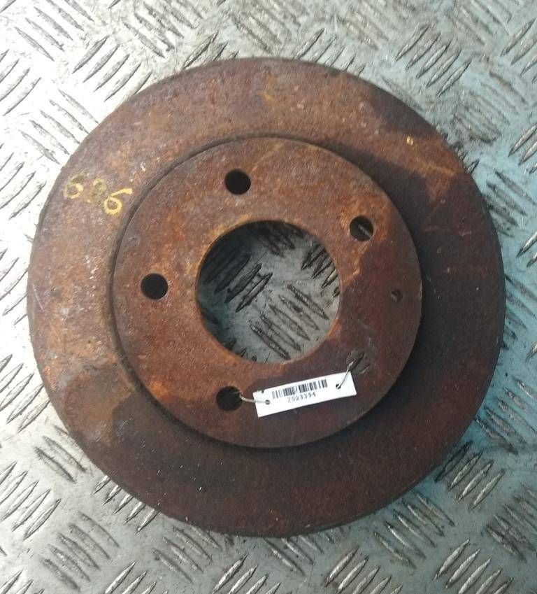 диск тормозной передний Mazda 626 GE 1991, 2.0 л., i, бензин, АКПП, седан, передний привод, GA4Y-33-25X - фото №1
