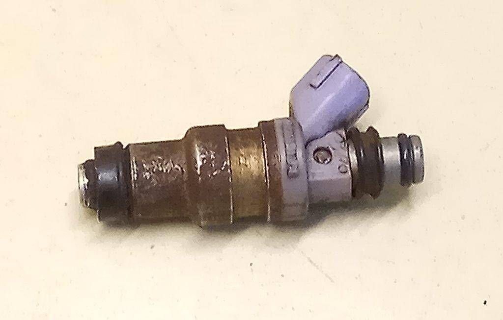 форсунка Toyota Corolla 6 поколение (E90) 1990, 1.3 л., i, бензин, 23250-11040 - фото №1