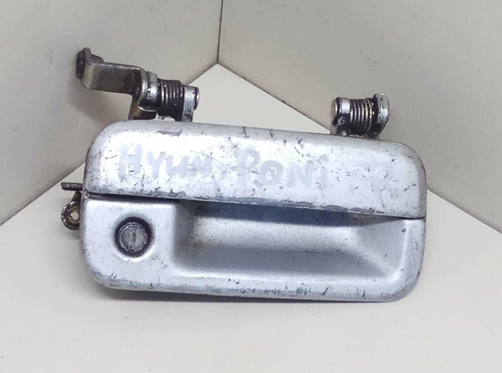 ручка наружная Hyundai Pony X2 1992 - фото №1
