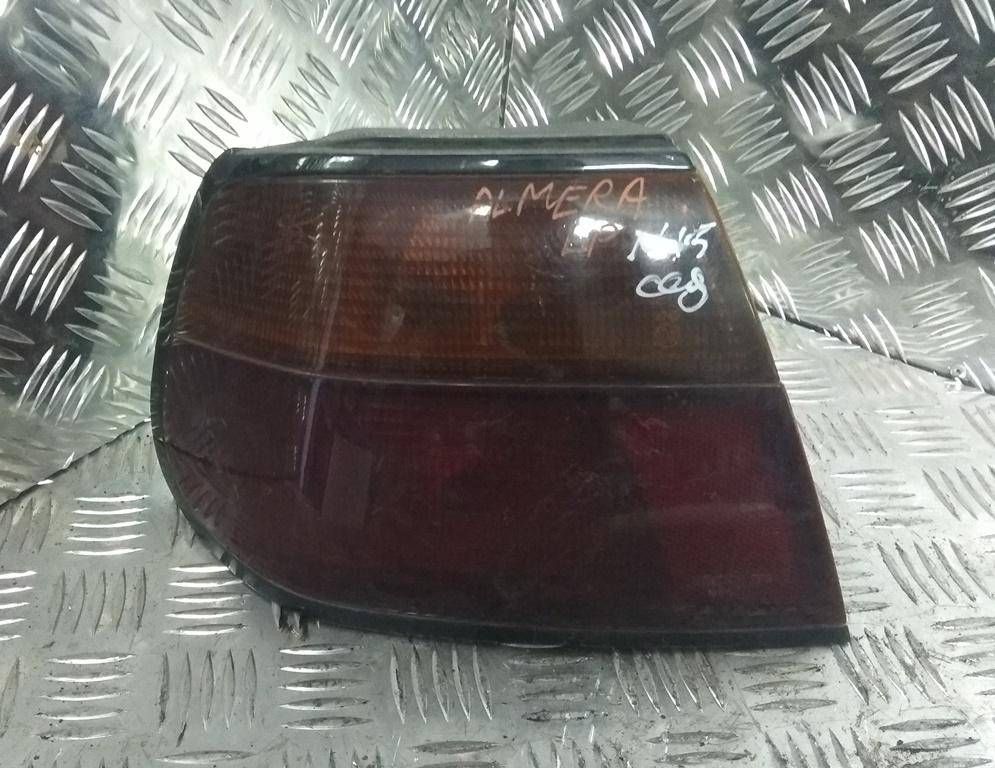 фонарь задний левый Nissan Almera N15 1998, 1.6 л., i, GA16DE, бензин, МКПП, серебристый, хетчбэк 5 дв., передний привод, 21519A2LA, 265550N028 - фото №1