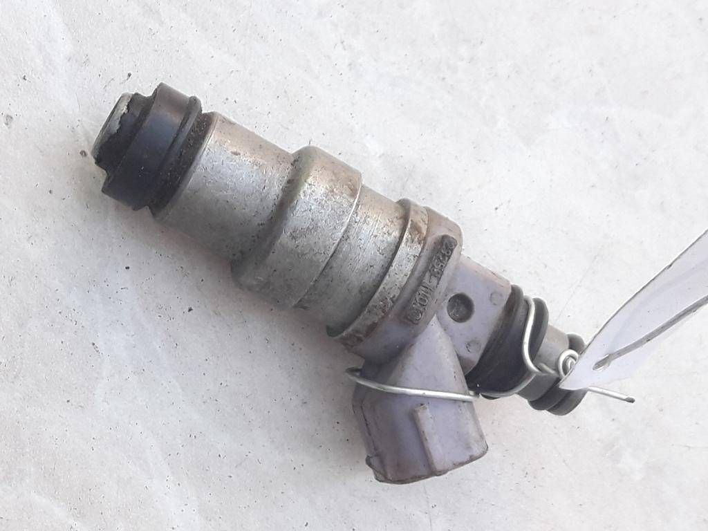 форсунка Toyota Corolla 7 поколение (E100) 1993, 1.3 л., i, бензин, 3235011040 - фото №1