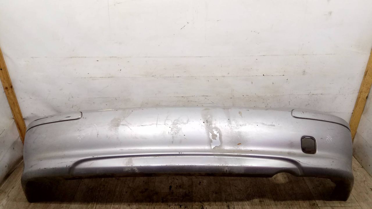 бампер задний Nissan Almera N16 2001, 1.8 л., i, QG18DE, бензин, МКПП, серебристый, хетчбэк 5 дв., передний привод, 850224M540 - фото №1