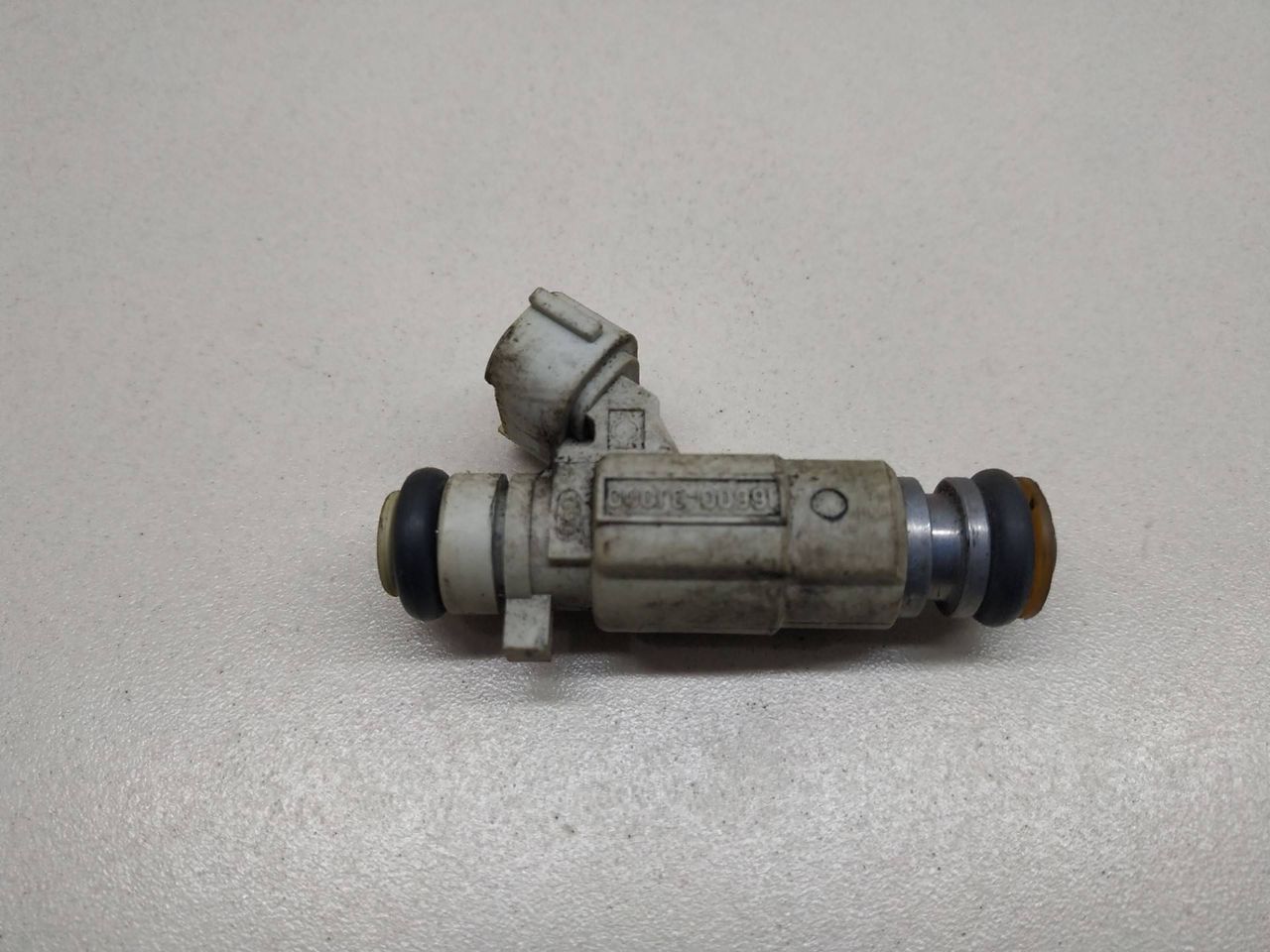 форсунка Nissan Primera P11 1997, 2.0 л., бензин, 0280155798, 16600-3J000 - фото №1