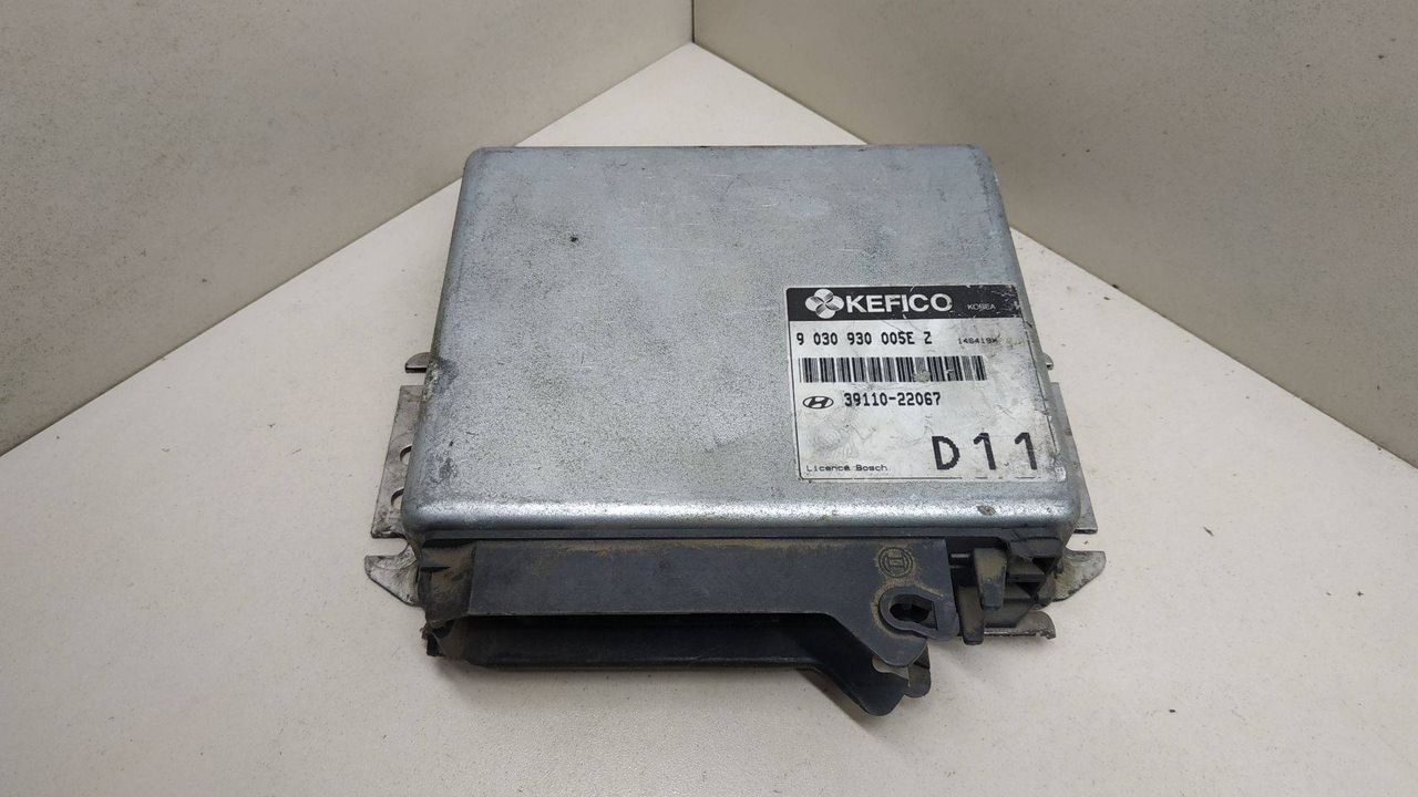 блок управления двигателем Hyundai S-Coupe 1 поколение 1992, 1.5 л., 9030930005EZ, 39110-22067, D11 - фото №1