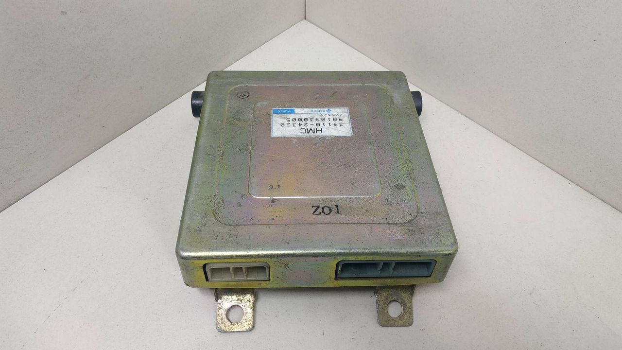 блок управления двигателем Hyundai Lantra J1 1992, 1.5 л., бензин, 39110-24320, 9010930005, 726429 - фото №1