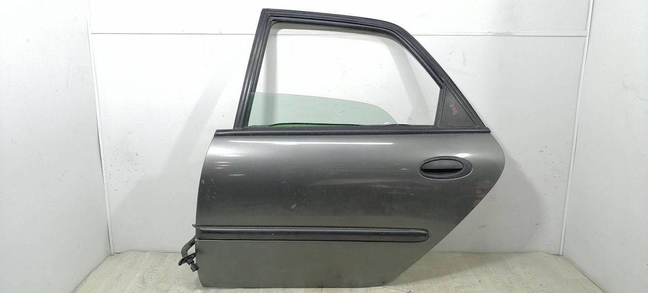 дверь задняя левая Renault Laguna 1 поколение 1998, 2.2 л., TD, G8T 752, дизель, 5МКПП, серый, универсал, передний привод, 7751468112 - фото №1