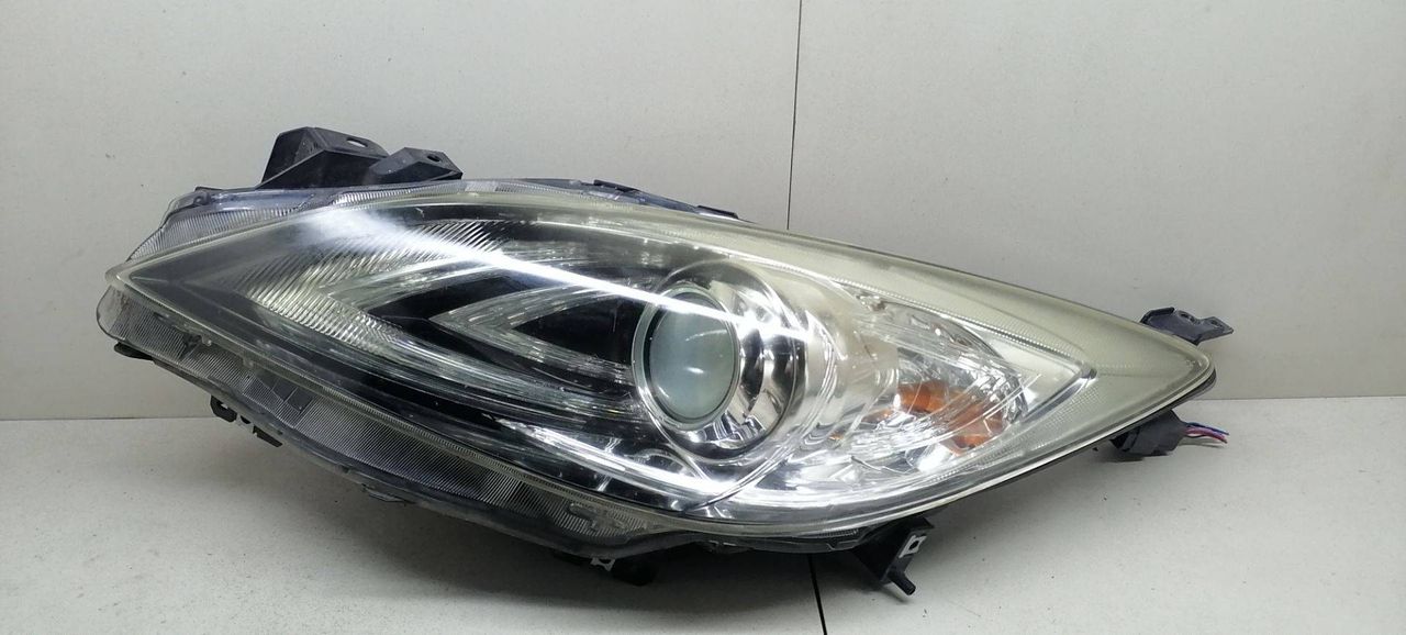 фара левая Mazda 3 BL 2009, 2.0 л., i, бензин, 5МКПП, чёрный, хетчбэк 5 дв., передний привод, BBP351041F - фото №1