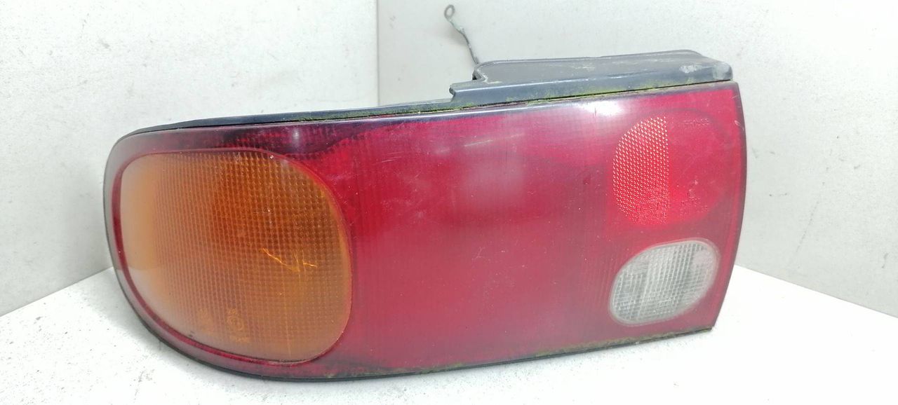 фонарь задний левый Mitsubishi Lancer 6 поколение CB4A 1993, 1.6 л., i, 4G92 (SOHC 16V), бензин, 5МКПП, синий, седан, передний привод, MB907247 - фото №1