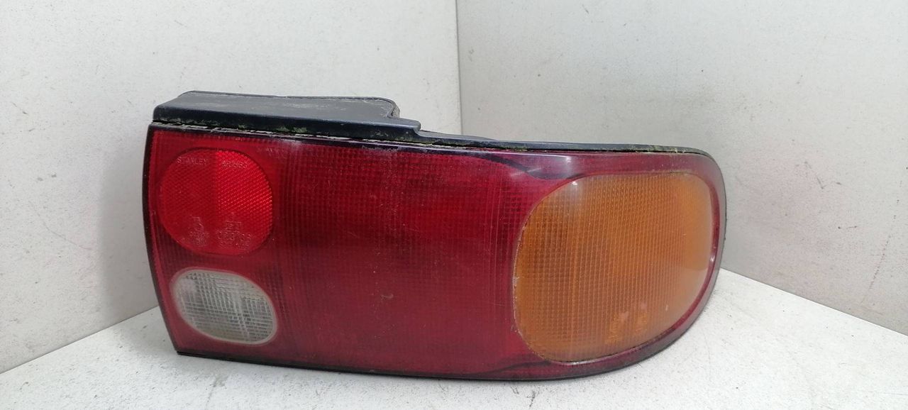 фонарь задний правый Mitsubishi Lancer 6 поколение CB4A 1993, 1.6 л., i, 4G92 (SOHC 16V), бензин, 5МКПП, синий, седан, передний привод, MB907248 - фото №1