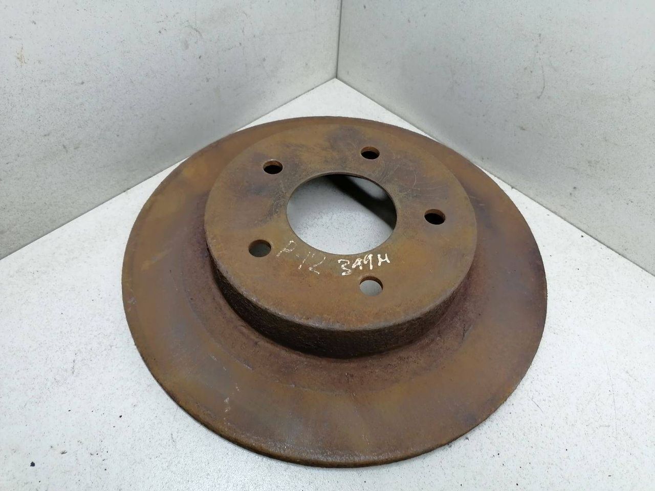 диск тормозной задний Nissan Primera P12 2004 - фото №1