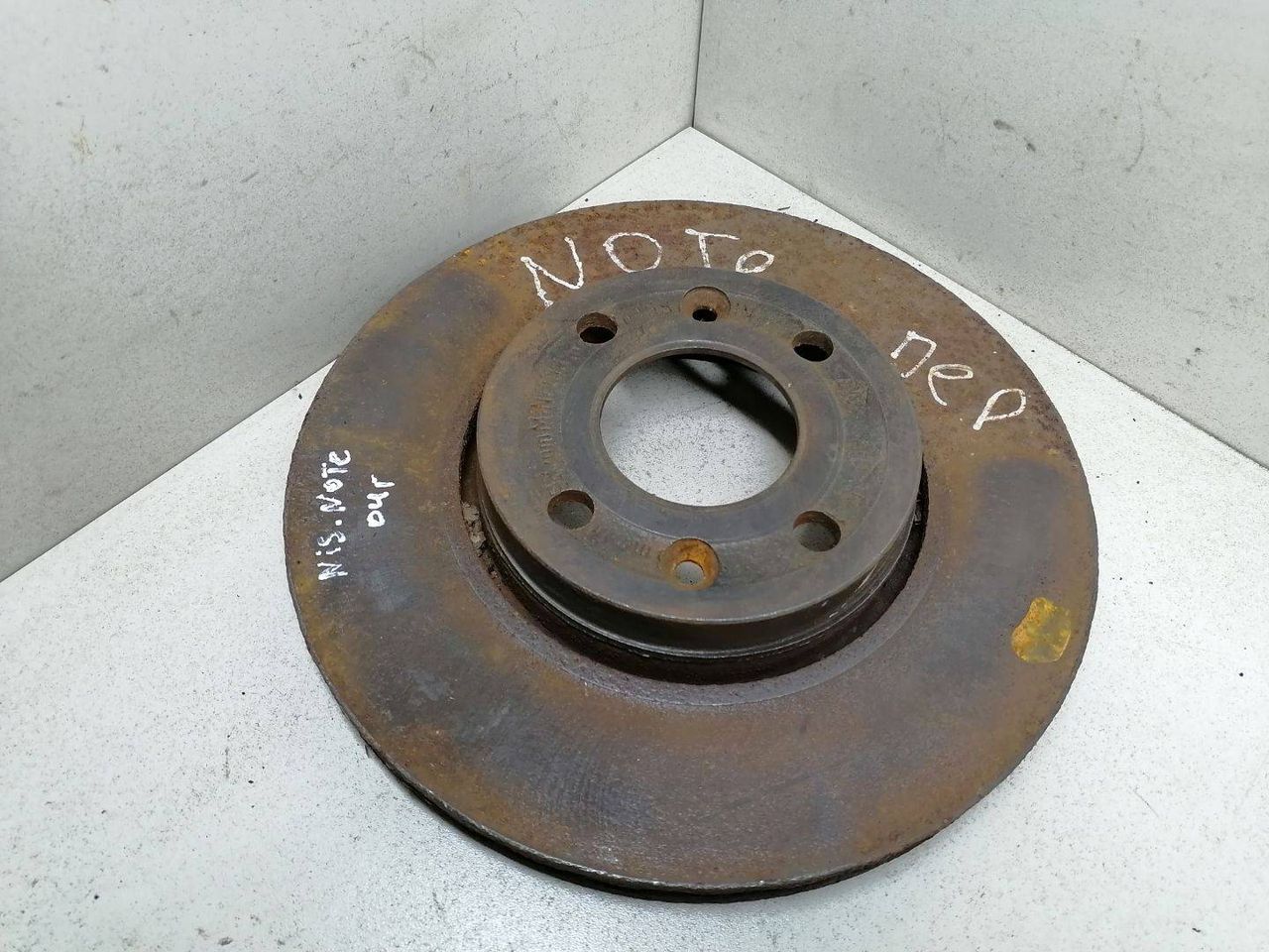 диск тормозной передний Nissan Note E11 2005 - фото №1