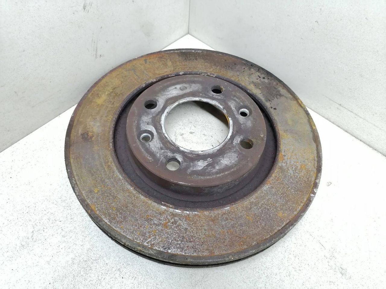 диск тормозной передний Peugeot 1007 1 поколение 2005, 1.4 л., HDi, 8HZ (DV4TD), дизель, 5МКПП, серебристый, хетчбэк 3 дв., 4246W7 - фото №1