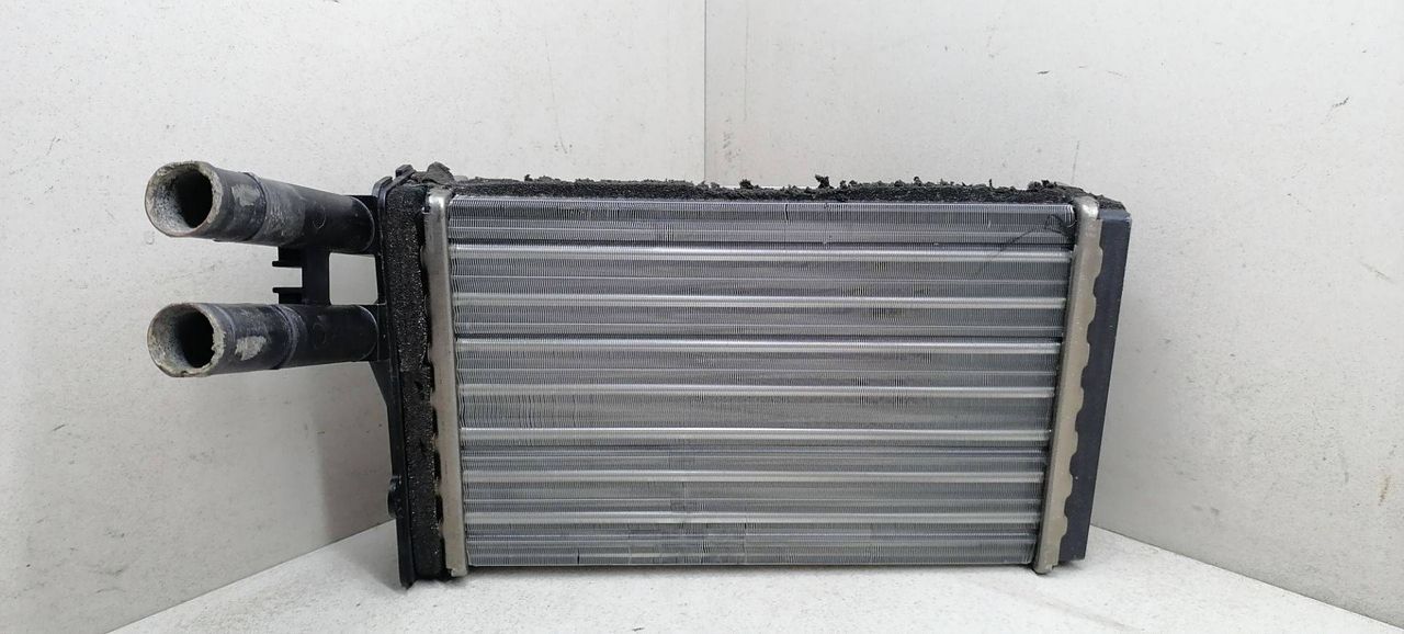 радиатор отопителя (печки) Audi A4 B5 1996, 1.9 л., TDi, AHU, дизель, 5МКПП, зелёный, седан, 8D2819031A, 8D1819030B - фото №1
