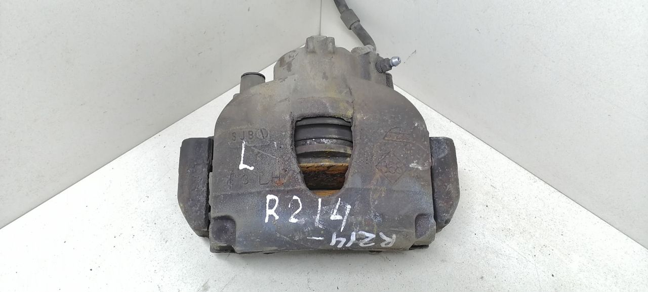 суппорт передний левый Renault Laguna 3 поколение 2008, 1.6 л., i, бензин, 6МКПП, синий, хетчбэк 5 дв., передний привод, ATE, 410110001R - фото №1