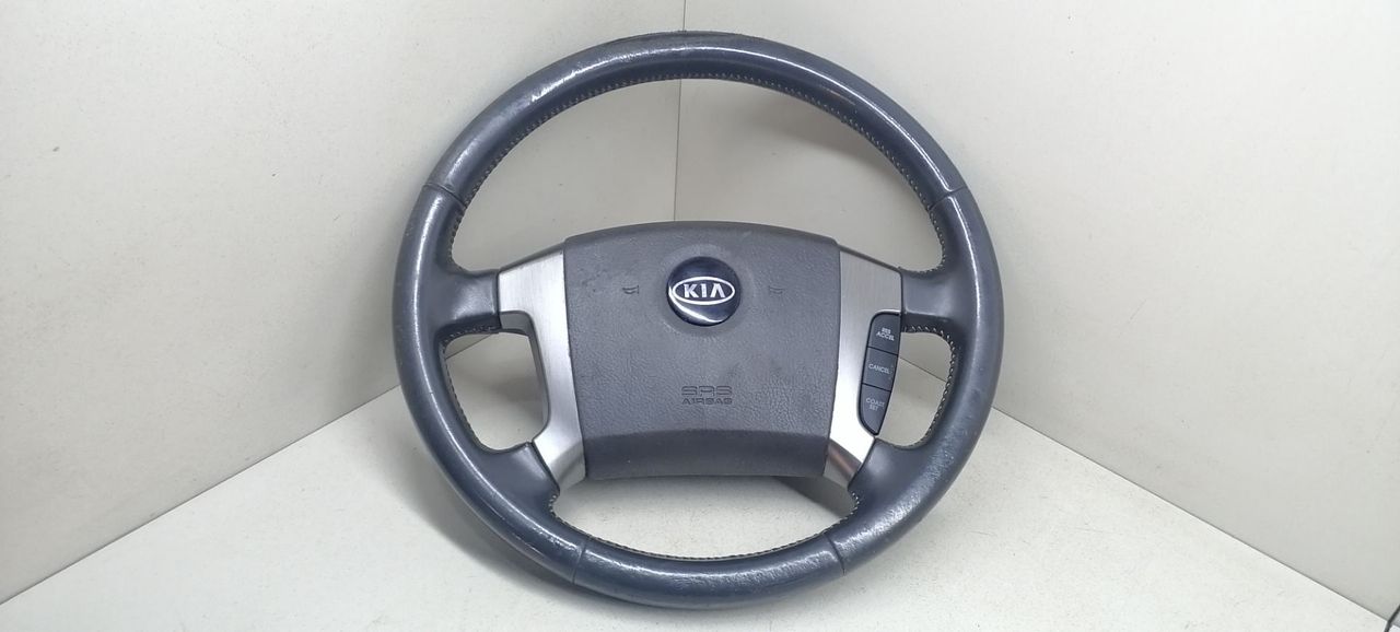 подушка безопасности водителя Kia Sorento 1 поколение 2004, 2.5 л., CRDi, D4CB, дизель, 5МКПП, чёрный, внедорожник 5 дв., полный подключаемый привод, 569103E010CQ - фото №1