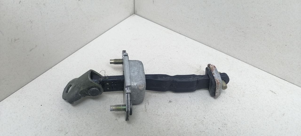 ограничитель открывания двери Subaru Outback 2 поколение BH9 2002, 2.5 л., i, бензин, АКПП, зеленый, универсал, полный привод, 62302FC000 - фото №1