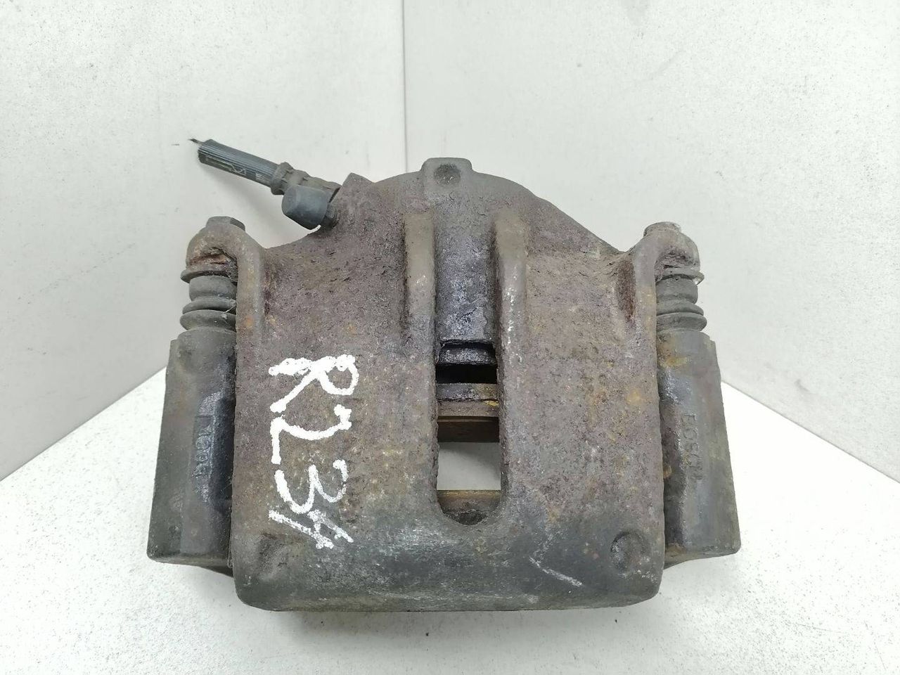 суппорт передний правый Renault Scenic 2 поколение JM0G 2003, 1.9 л., DCi, F9Q 812, дизель, 6МКПП, бордовый, минивэн, BOSCH, 7701207686, 7711135735 - фото №1