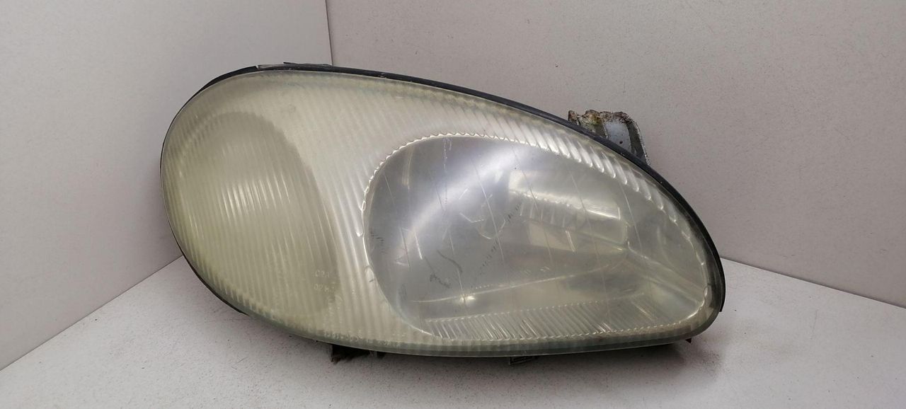 фара правая Daewoo Lanos T100 1998, 1.3 л., MPI, A13SMS, бензин, 5МКПП, зелёный, хетчбэк 3 дв., передний привод, 96304611 - фото №1