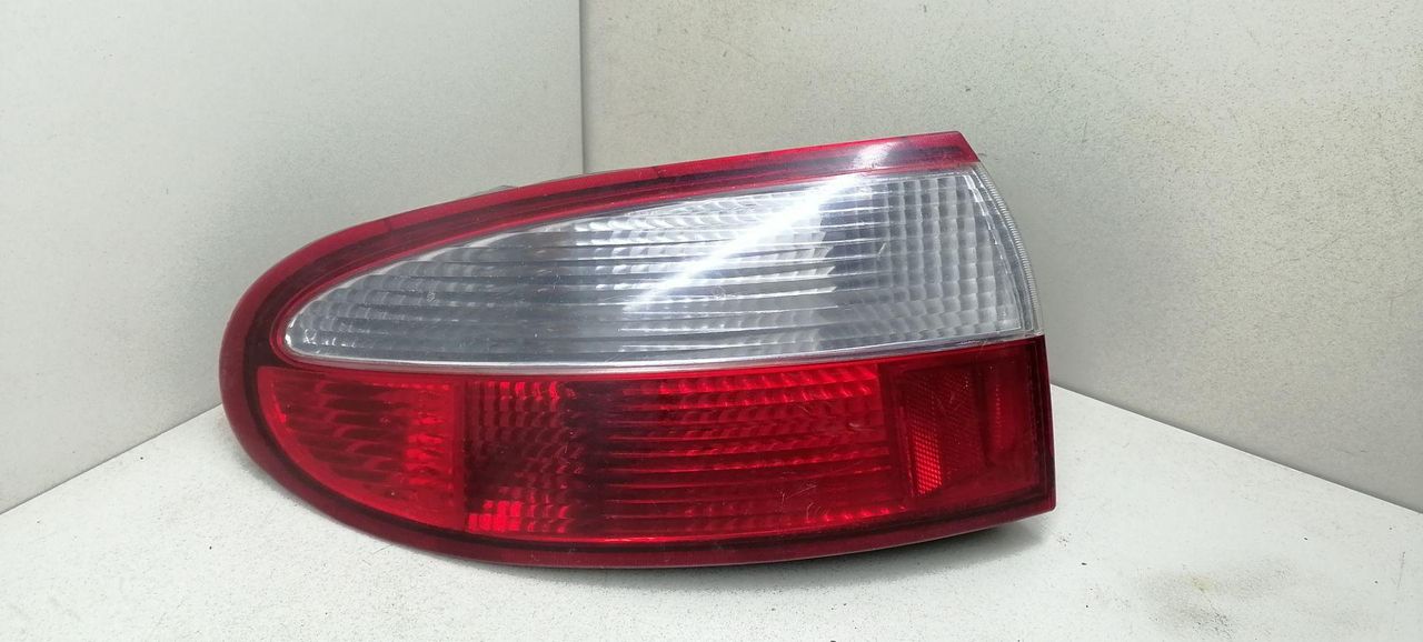 фонарь задний левый Daewoo Lanos T100 1998, 1.3 л., MPI, A13SMS, бензин, 5МКПП, зелёный, хетчбэк 3 дв., передний привод, 96304618 - фото №1