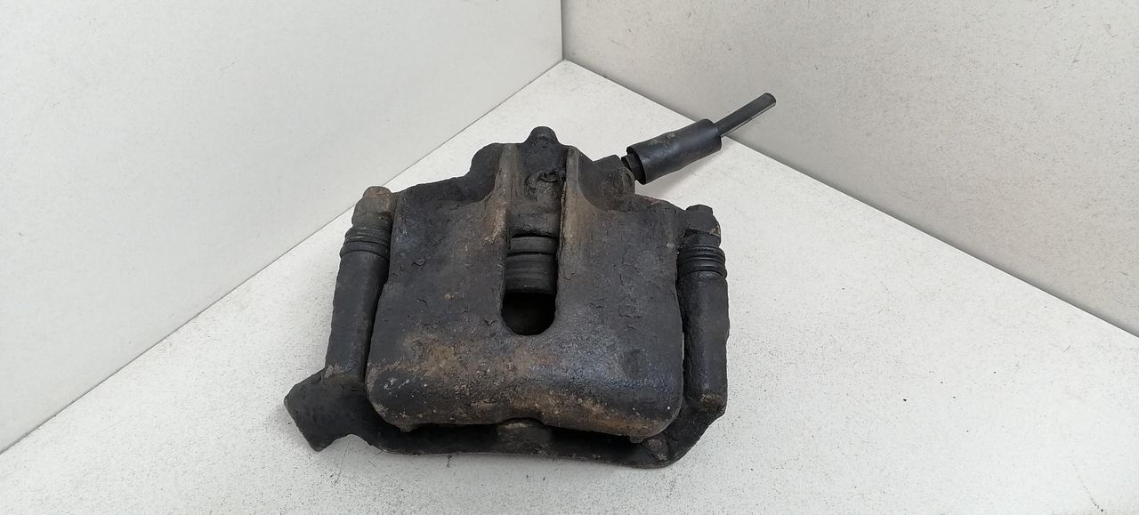 суппорт передний левый Renault Laguna 1 поколение 1997, 2.2 л., DT, G8T 792, дизель, 5МКПП, синий, универсал, передний привод, 7701203659 - фото №1