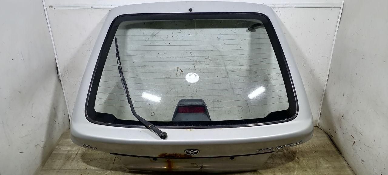 стекло заднее Toyota Corolla 7 поколение (E100) EE101 1996, 1.3 л., 4E-FE, бензин, хетчбэк 3 дв. - фото №1