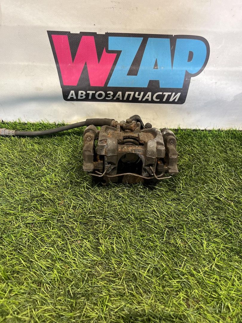 суппорт задний левый Volkswagen Jetta 7 поколение 2019, 1.4 л., бензин, АКПП, седан, передний привод, 5QM615405
