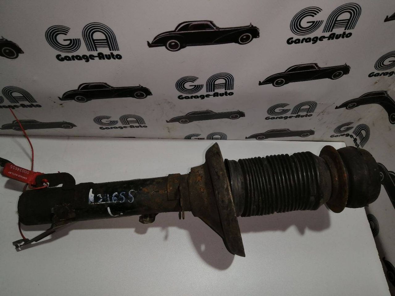 амортизатор передний левый Volkswagen Golf 4 поколение 2002, 1.9 л., дизель, хетчбэк 5 дв.