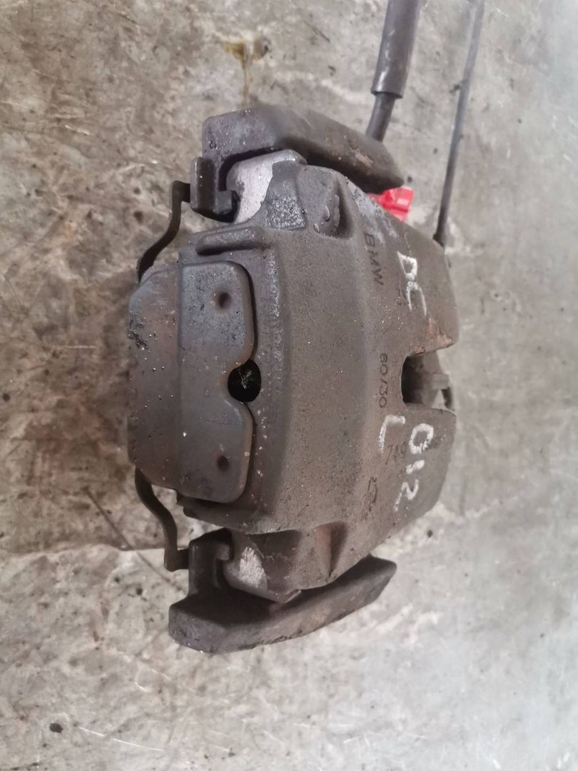 суппорт передний левый BMW X5 E70 2008, 3.0 л., M57 D30 (306D3), дизель, АКПП, черный, внедорожник 5 дв.