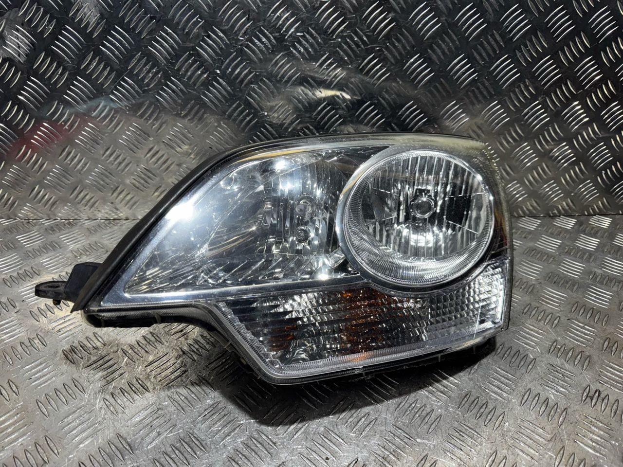 фара левая Opel Antara 1 поколение [рестайлинг] 2012, 2.2 л., дизель, 5МКПП, внедорожник 5 дв.