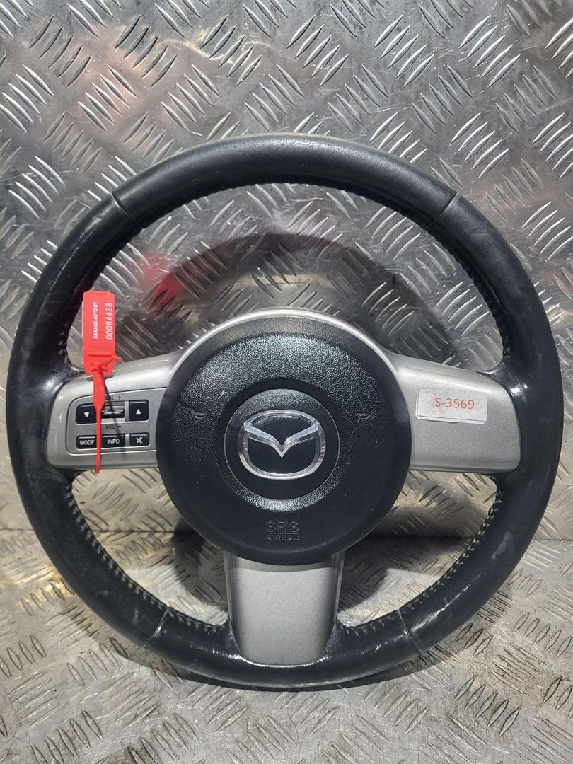 руль Mazda 2 2 поколение [рестайлинг] 2012, 1.4 л., бензин, 5МКПП, хетчбэк 5 дв.