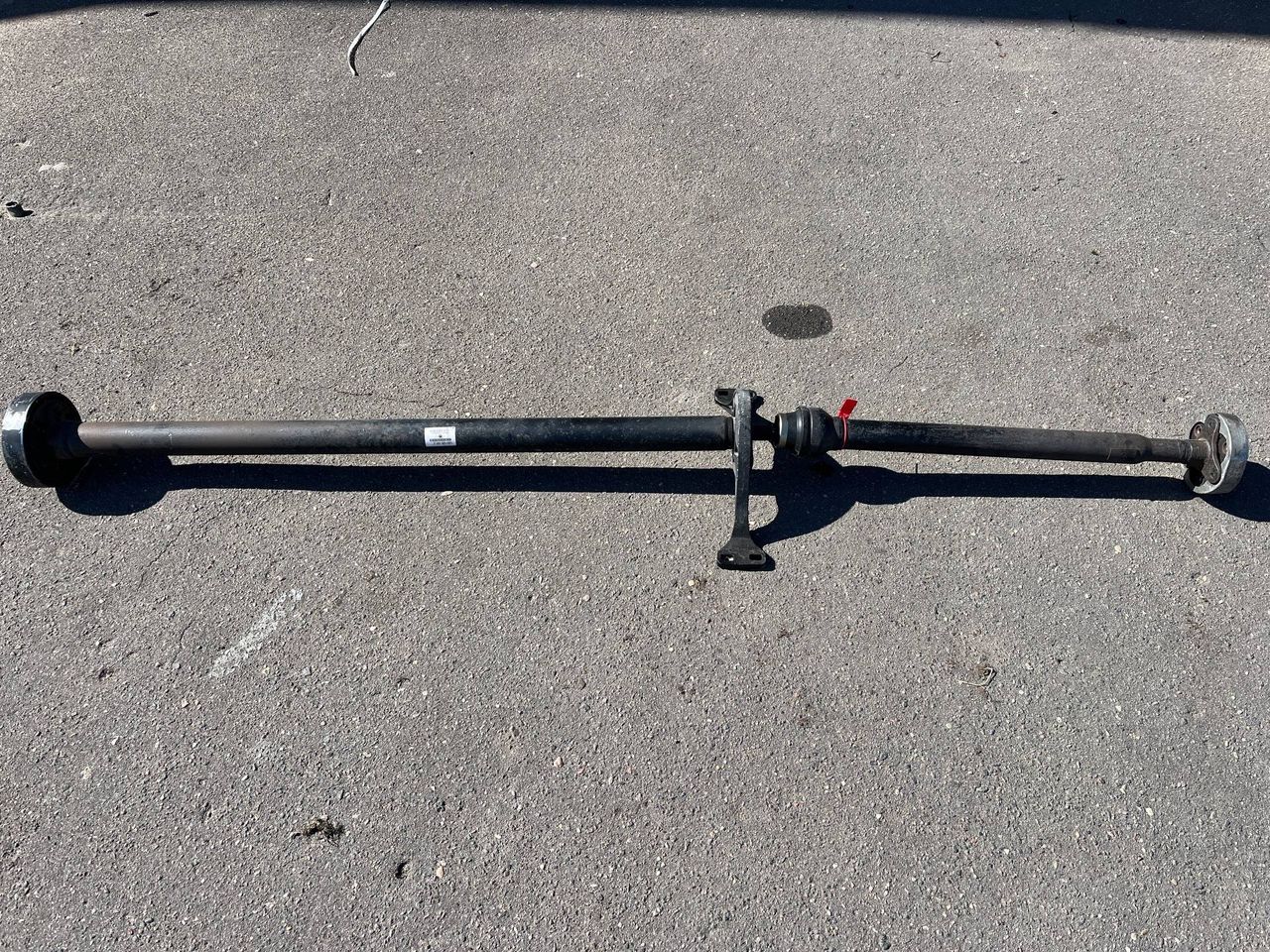 карданный вал Volkswagen Tiguan 1 поколение [рестайлинг] 2012, 2.0 л., CCZA, бензин, АКПП, внедорожник 5 дв., полный привод, 5N0521101E