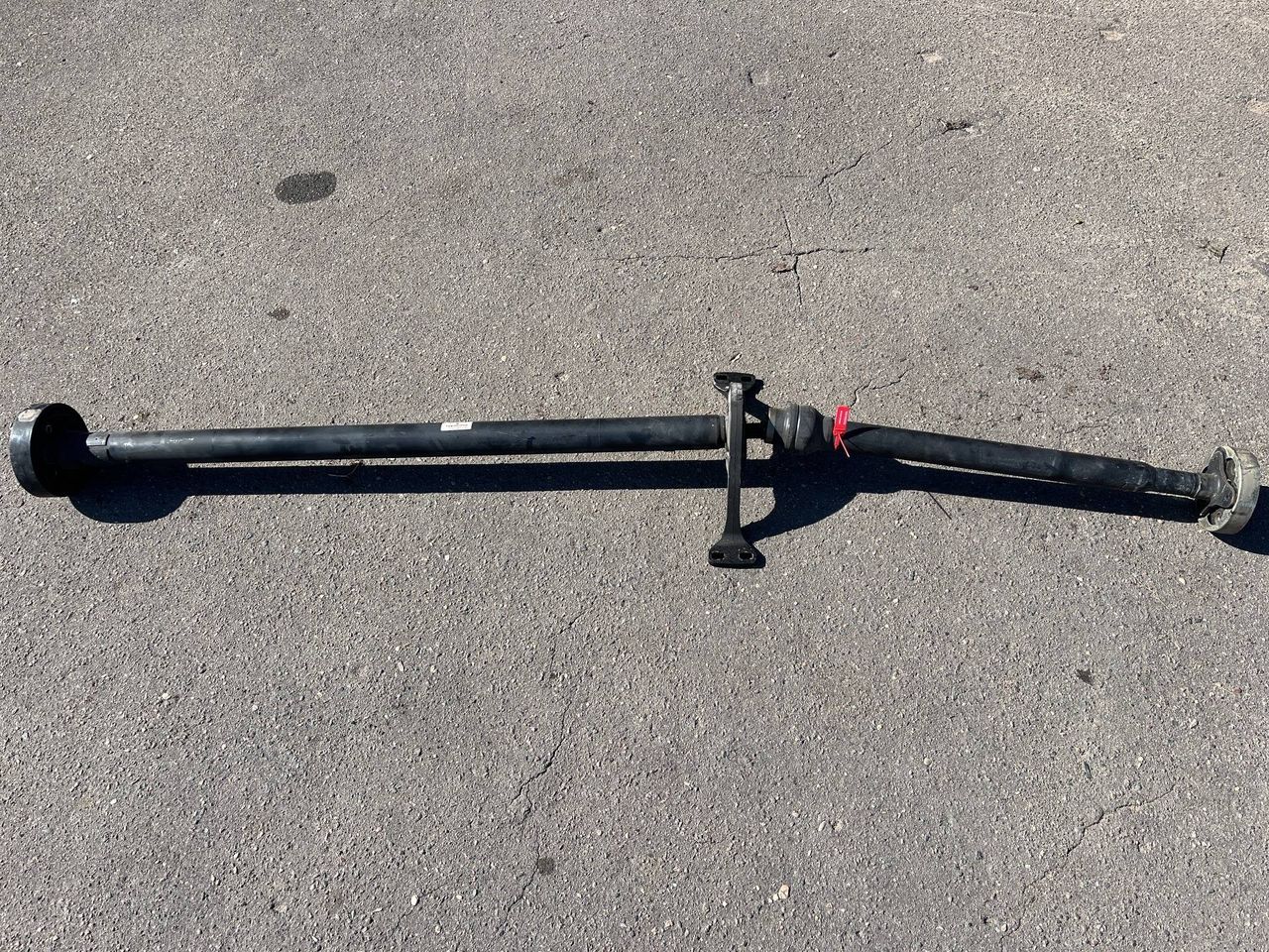 карданный вал Volkswagen Tiguan 1 поколение [рестайлинг] 2012, 2.0 л., CCZA, бензин, АКПП, внедорожник 5 дв., полный привод, 5N0521101E