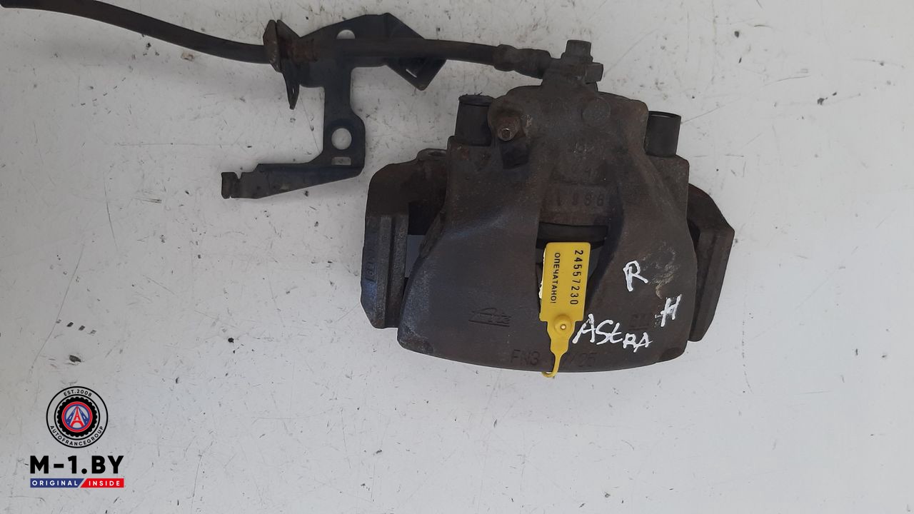 суппорт передний правый Opel Astra H 2004, 1.7 л., дизель