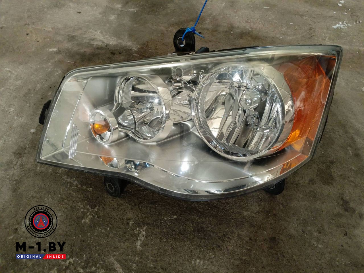 фара левая Chrysler Voyager 5 поколение (2007 - 2011), 05113341AE
