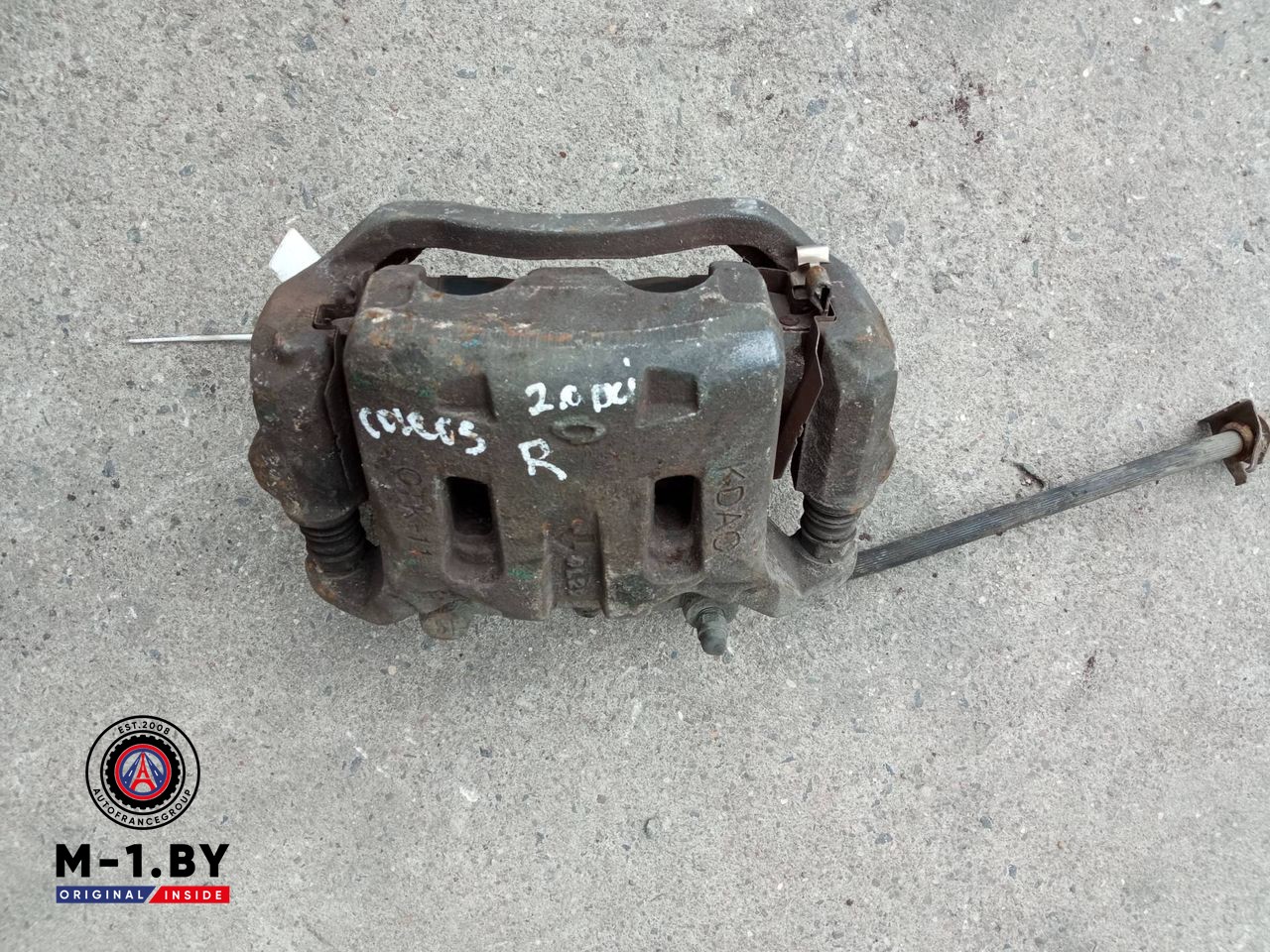 суппорт передний правый Renault Koleos 1 поколение (2008 - 2011)