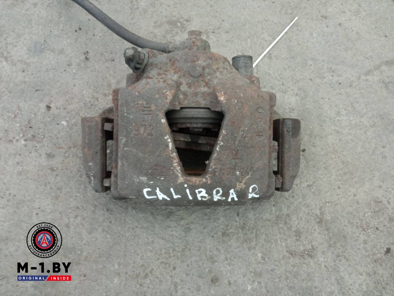 суппорт передний правый Opel Calibra 1 поколение [рестайлинг] (1994 - 1997)
