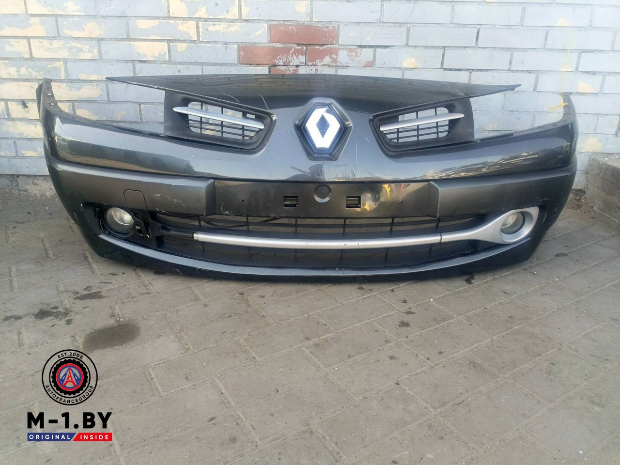бампер передний Renault Megane 2 поколение [рестайлинг] (2006 - 2012)