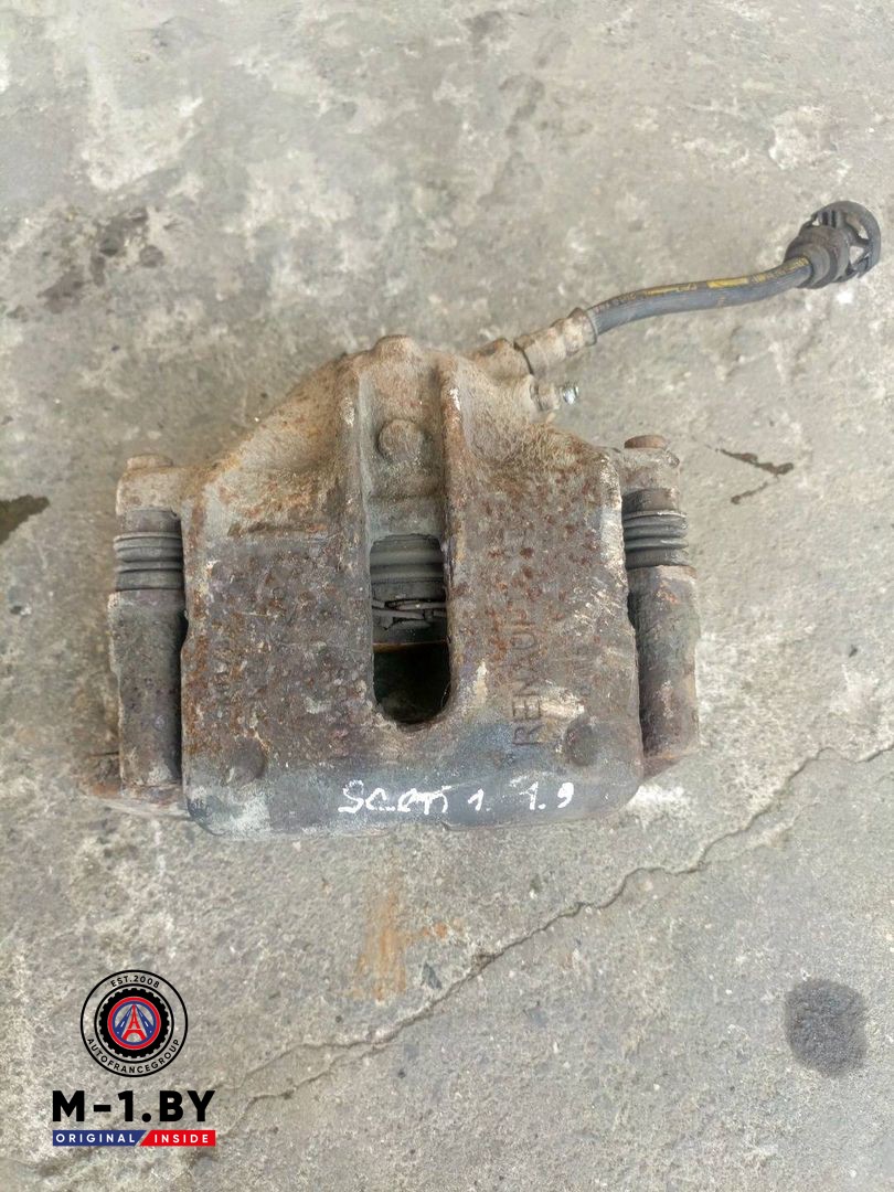 суппорт передний левый Renault Scenic 1 поколение [рестайлинг] (1999 - 2003), 1.9 л., дизель
