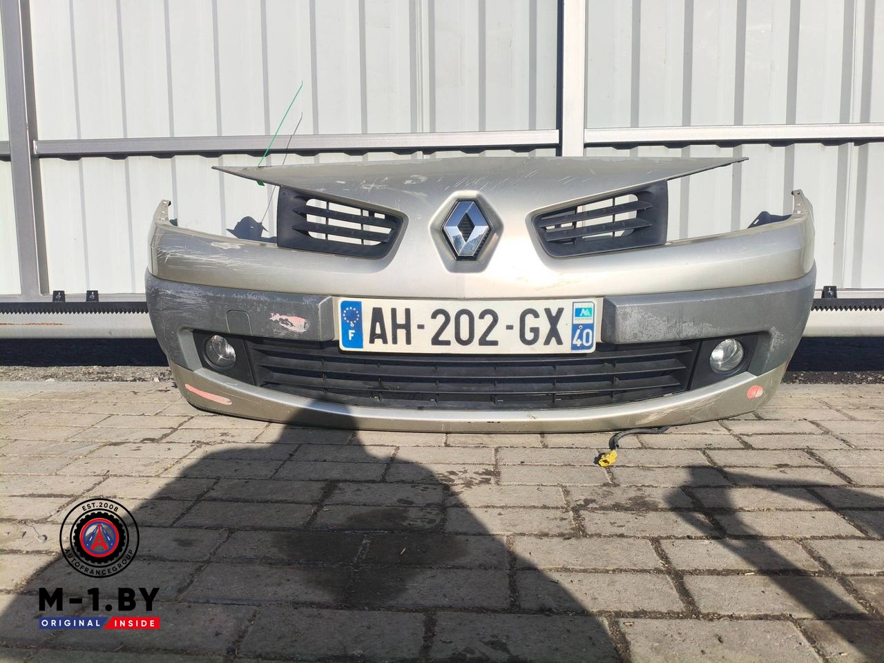 бампер передний Renault Megane 2 поколение [рестайлинг] (2006 - 2012)