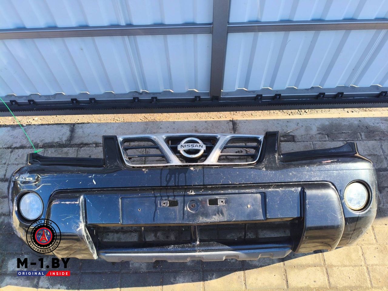 бампер передний Nissan X-Trail T30 [рестайлинг] (2004 - 2007)